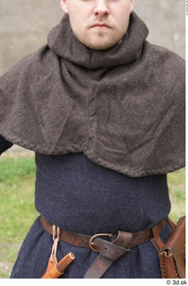  Photos Medieval Servant in suit 3 Grey Hood Medieval servant hand-bag leather belt medieval clothing upper body 0001.jpg